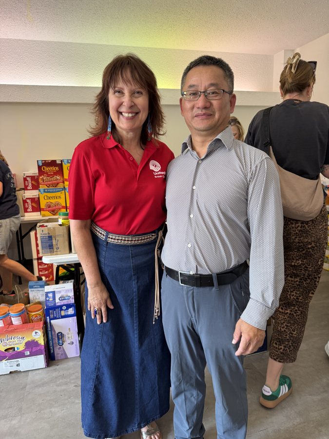 With a United Way BC team member at the donation centre